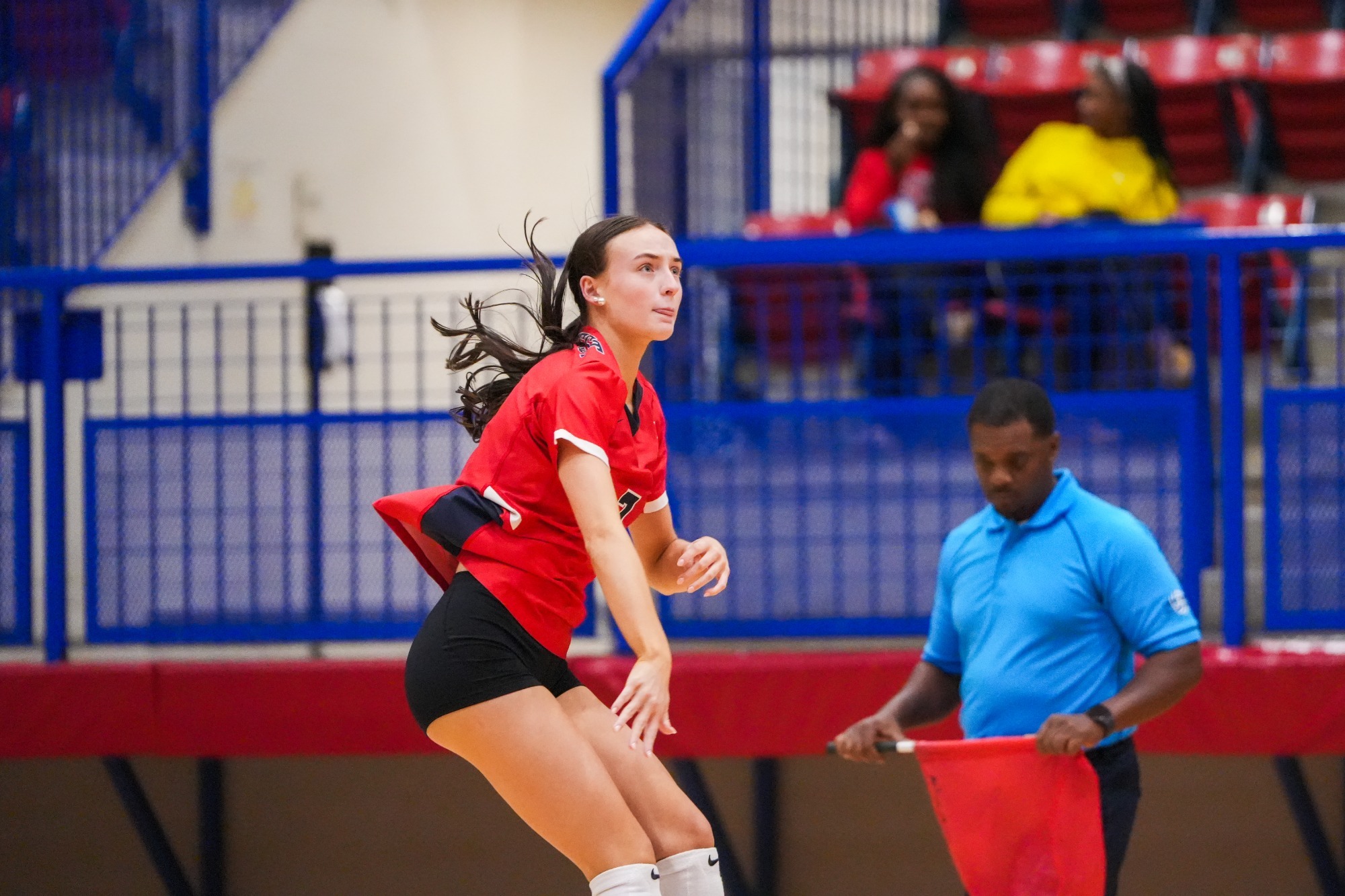 Reese serves against Rust College