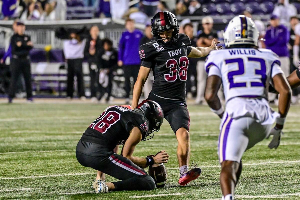 Wolfe kicking for Troy