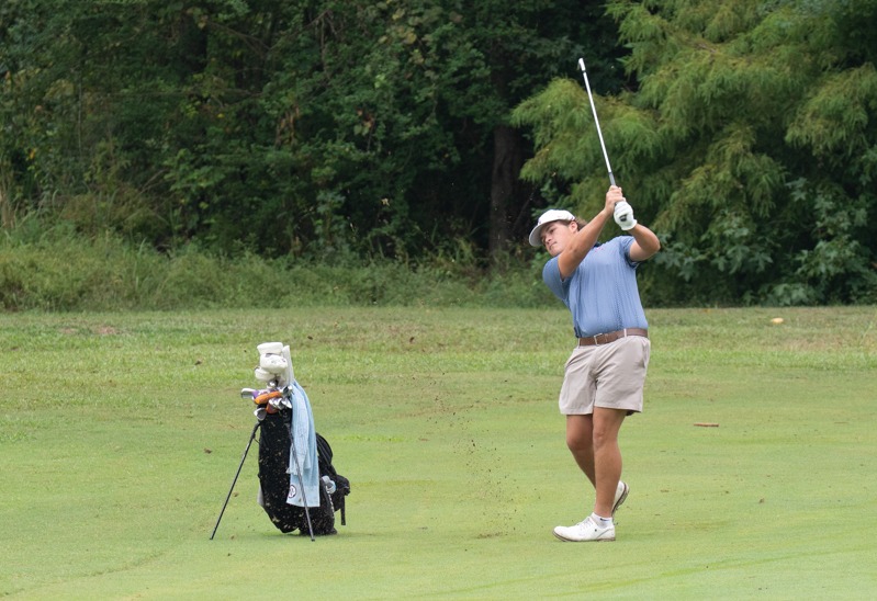 Mac Stacey hits an approach at the Jim Redgate Invitational