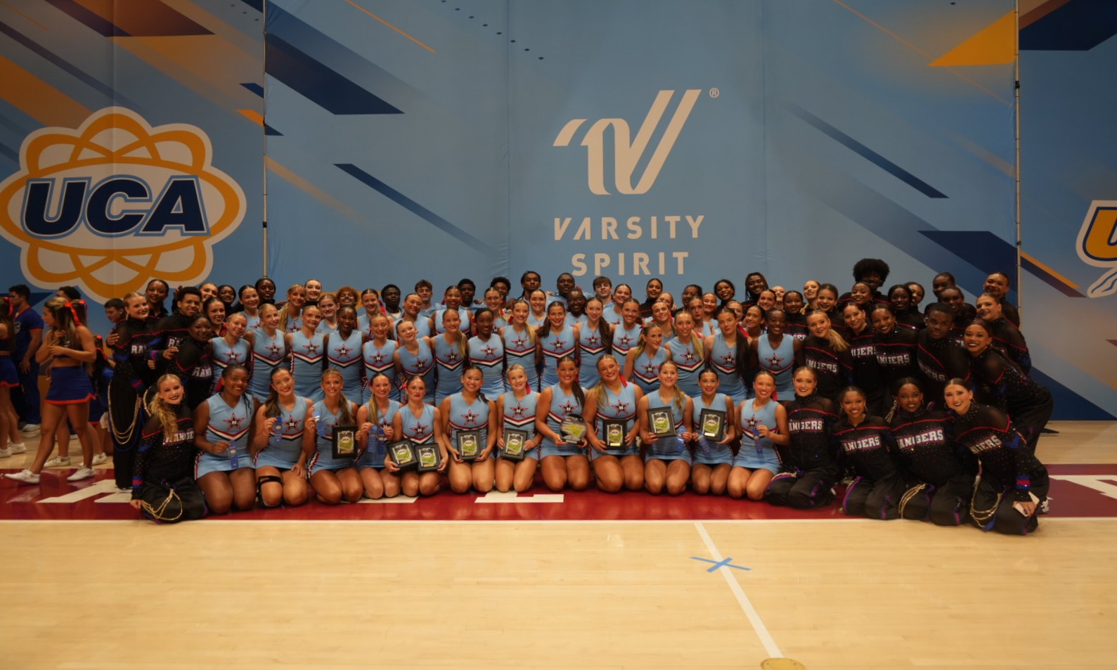 Cheer and Dance pose for a team photo at the UDA/UCA Team Camp at the University of Alabama