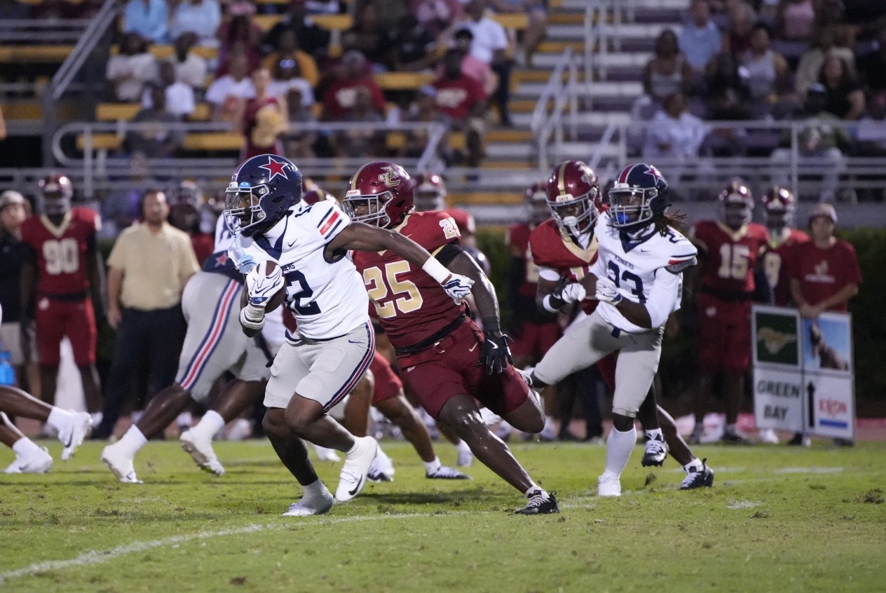 Clifton takes in a punt return against Jones College in the first half