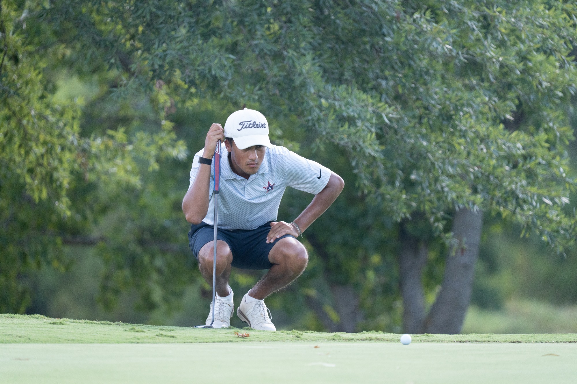 Sharma lines up a putt at the Ranger Men's Invitational