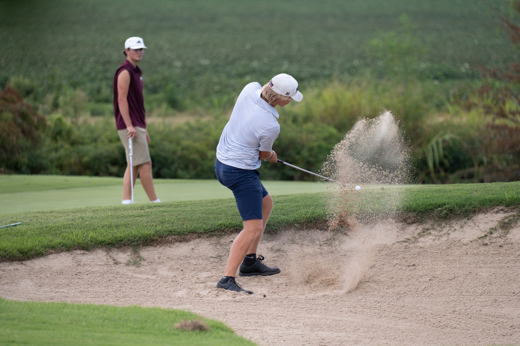 Ingendorf plays out of a bunker at the Ranger Invitational