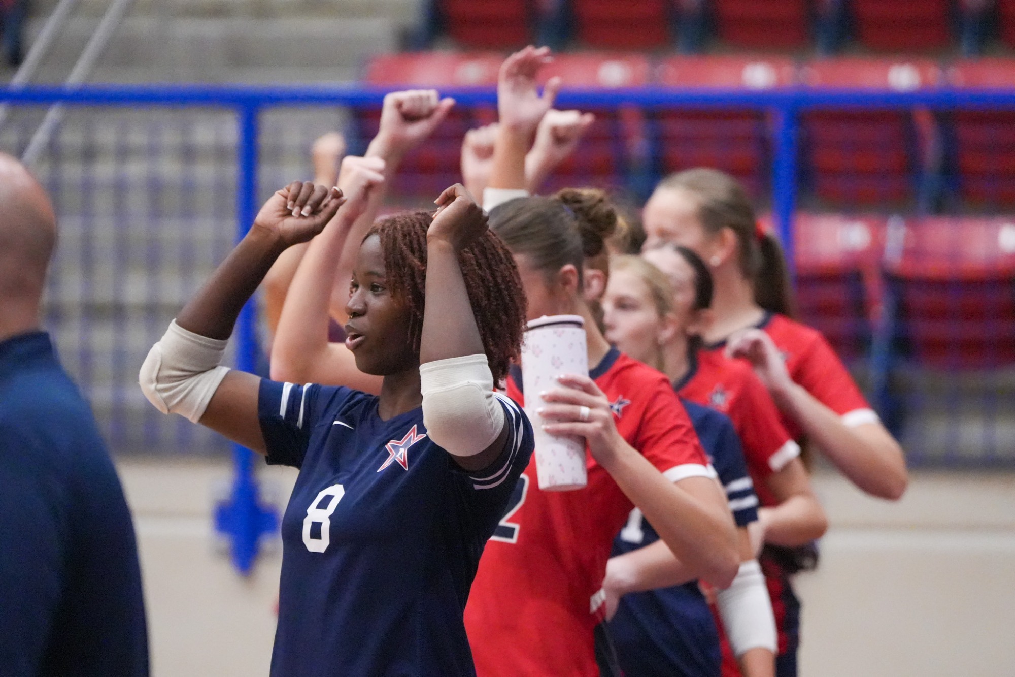 Rangers celebrate against Northeast at Howard Coliseum