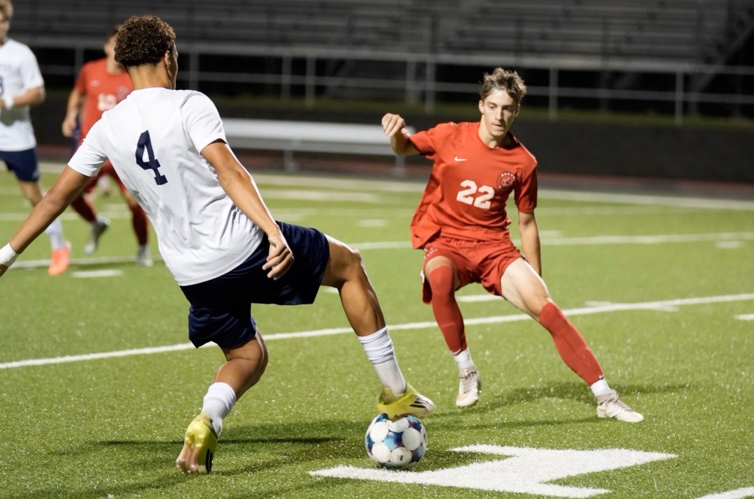 Wesley Kilpatrick fights for a ball on the road at Southwest