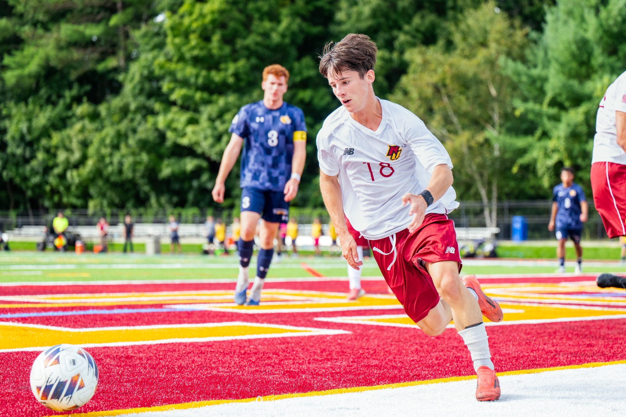 Rubenstein chasing after a loose ball.