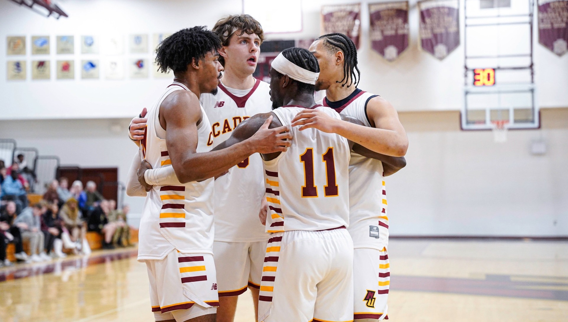 2025-26 MBB - huddle photo