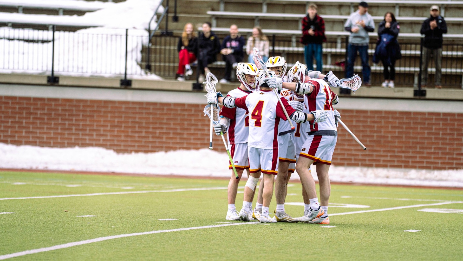 2026 MLAX - huddle photo