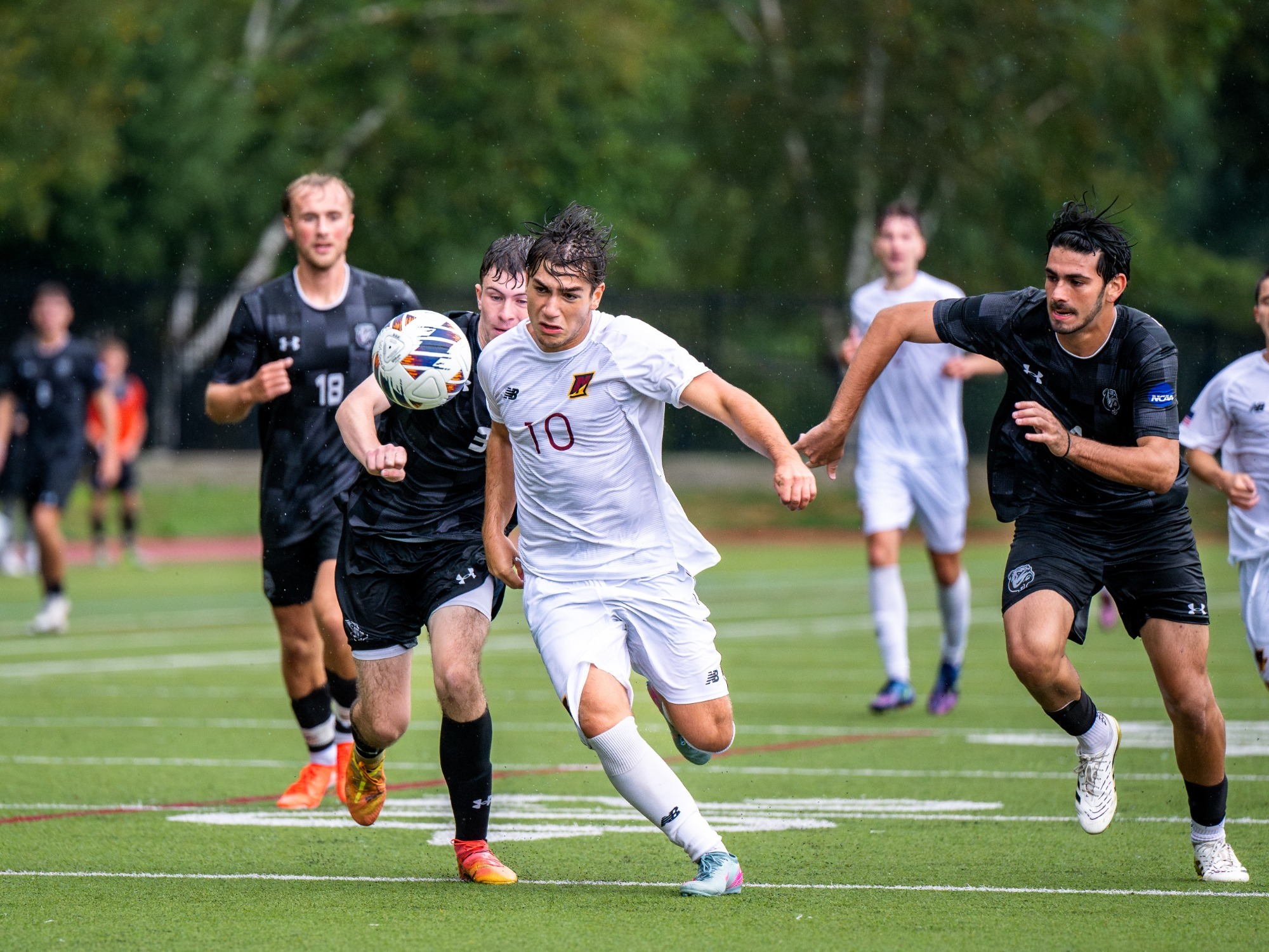Diego Fuentes battles for a loose ball.