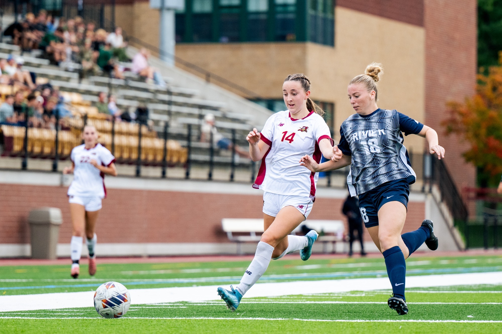 Smith battling for a loose ball in the attacking third.