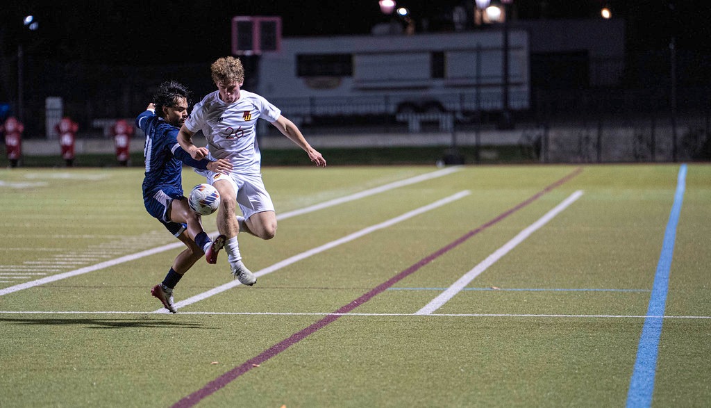 Bergeson fighting to win a loose ball. 