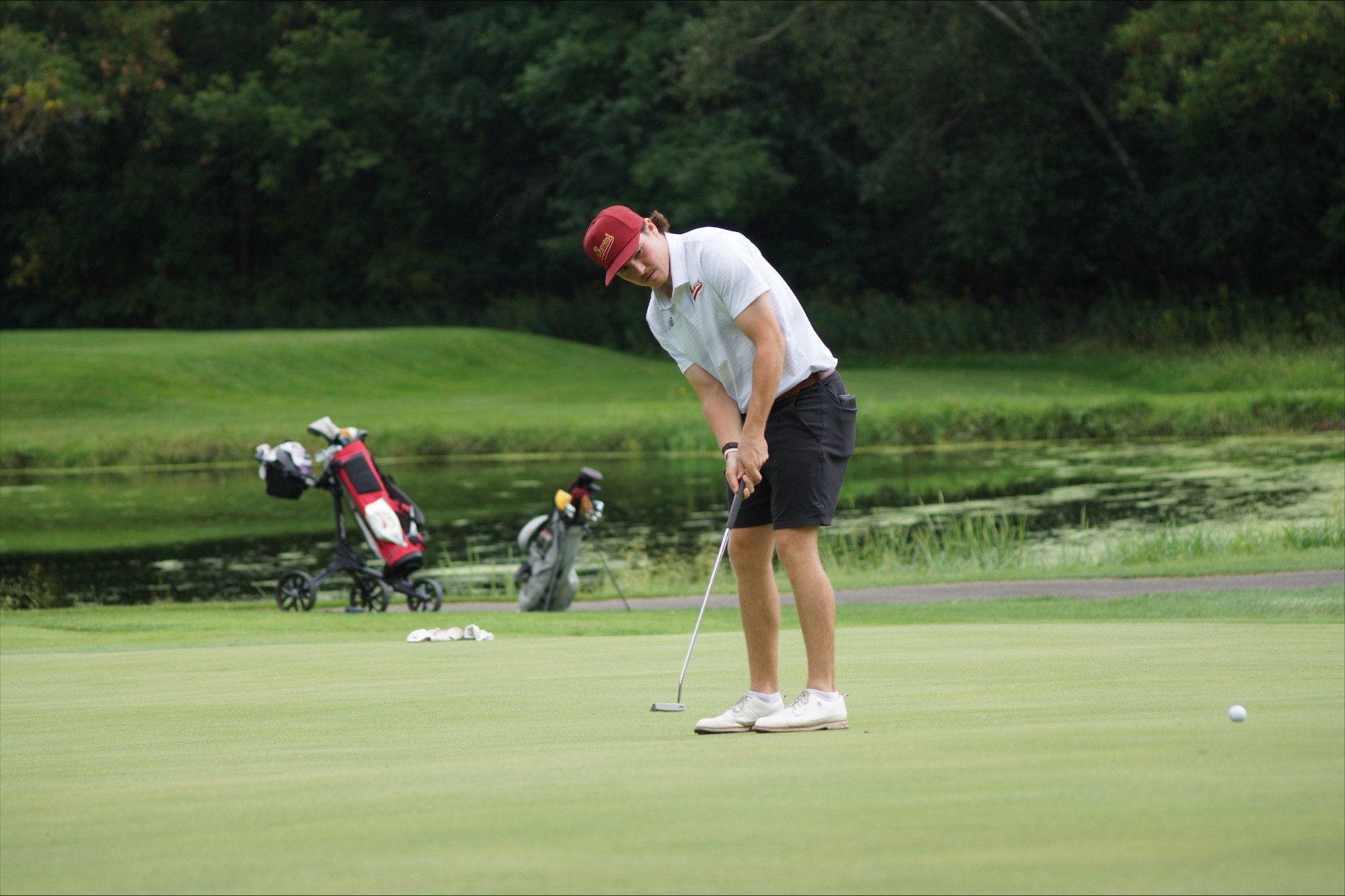 Bertrand putting on the green at St. Lawrence. 