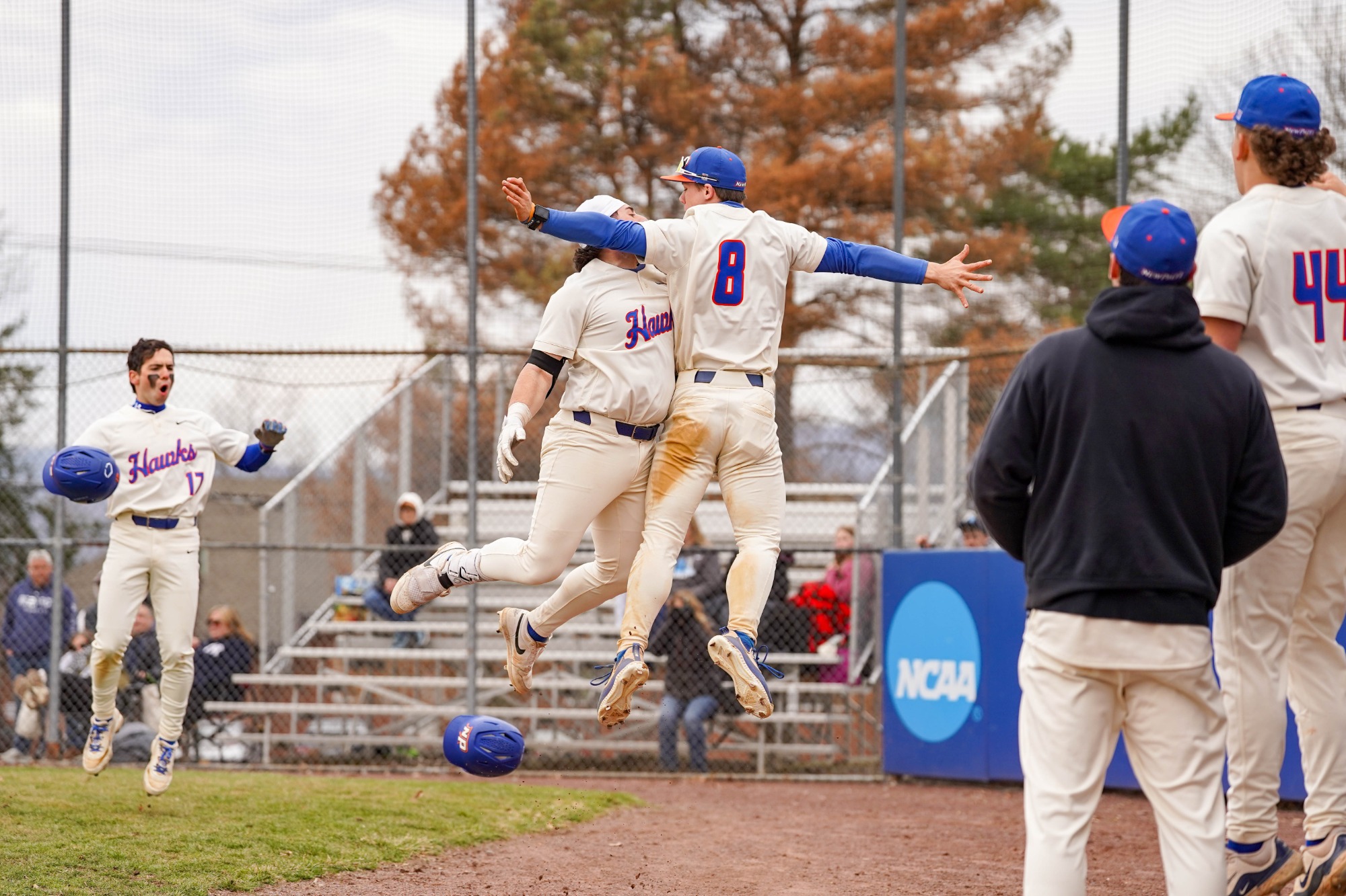Wallace Kirkpatrick and Matt Sarni celebrates after a home run