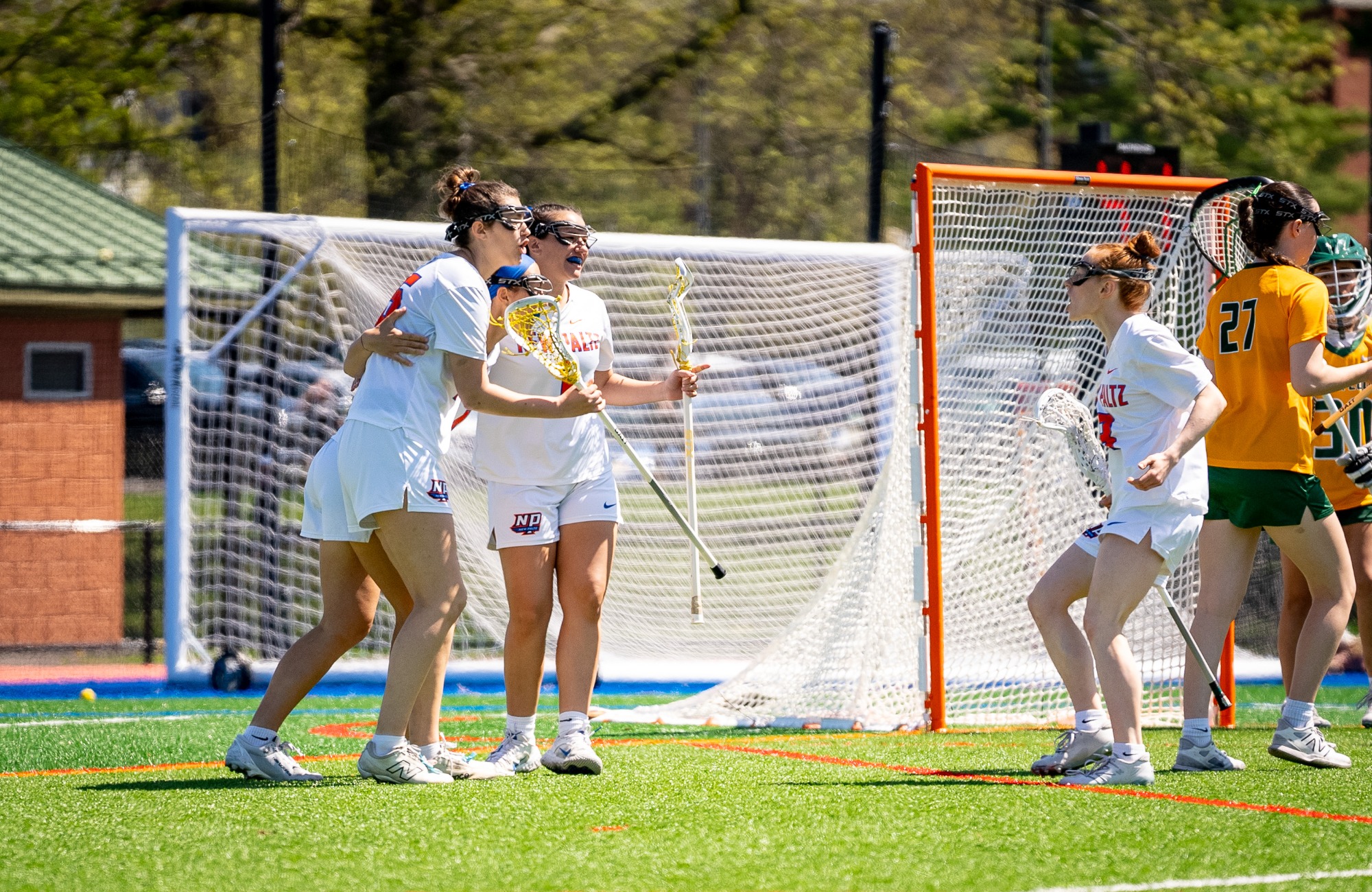 Allison Beattie, Mia Baldinger, Ava Padilla and Lexi Atwater celebrate after a goal