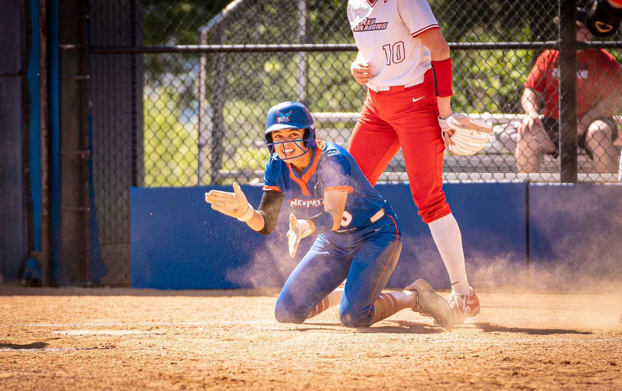 Ava Thys celebrates after scoring the game's go-ahead run
