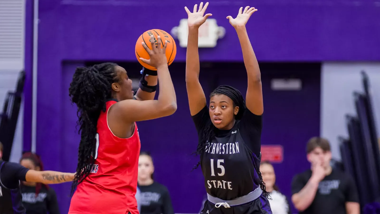 NSU 15 Clarence Djuela NICH 30 Emani Burks