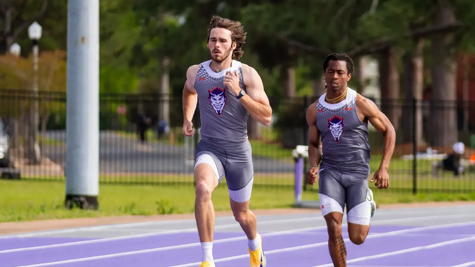 William Achee (left) and Kason Jones in the 400 meter dash
