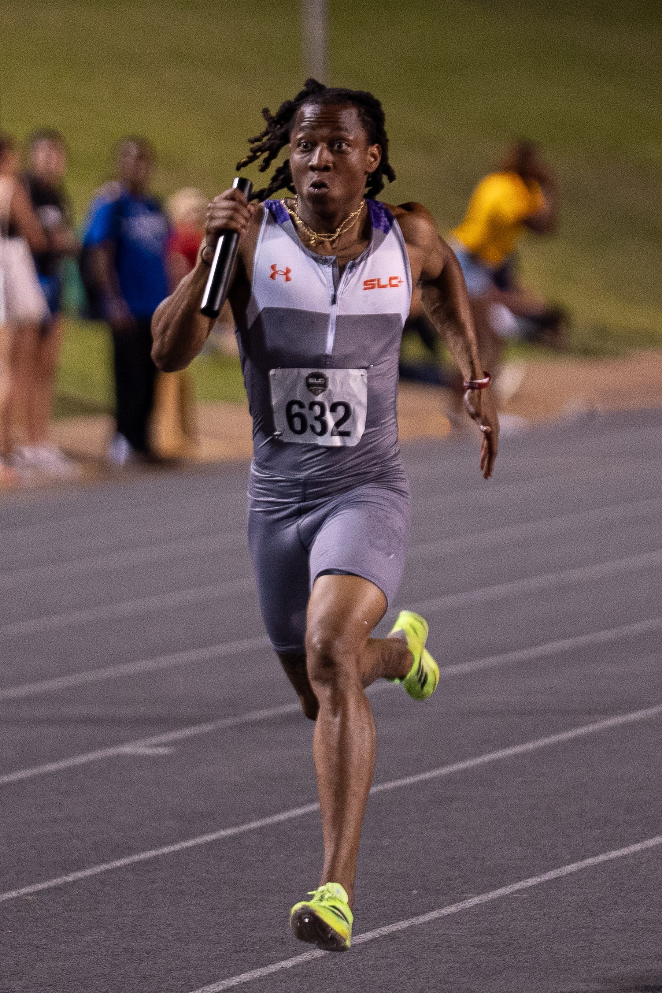 Kason Jones running the first leg of the 4x400 meter relay