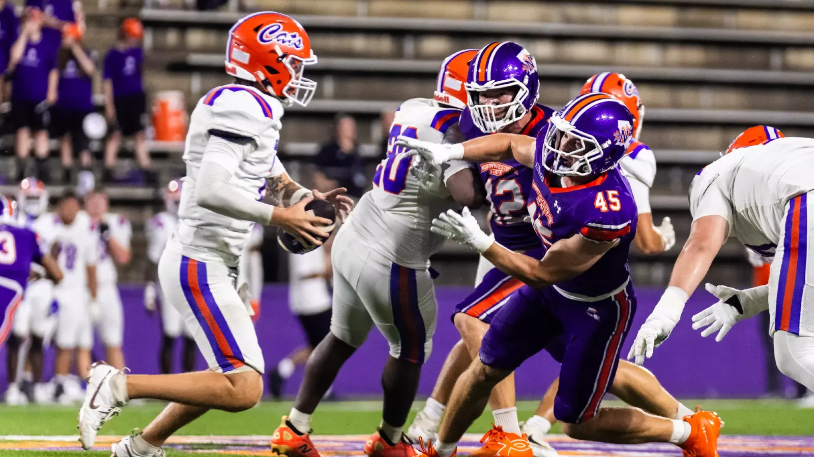 NSU 45 Ben Bienvenu rushes the quarterback