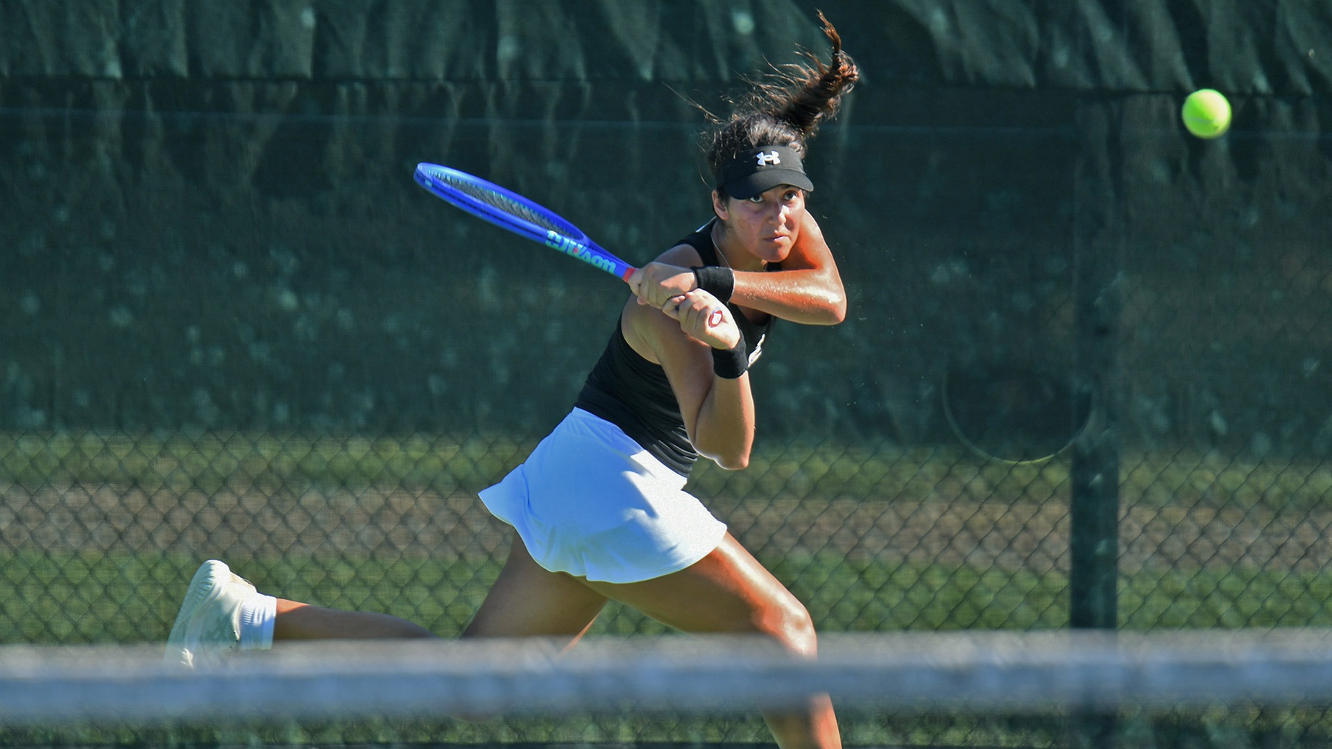 Martina Acebedo Bonocore returns a shot during Day 1 of the Lady Demon Invitational.