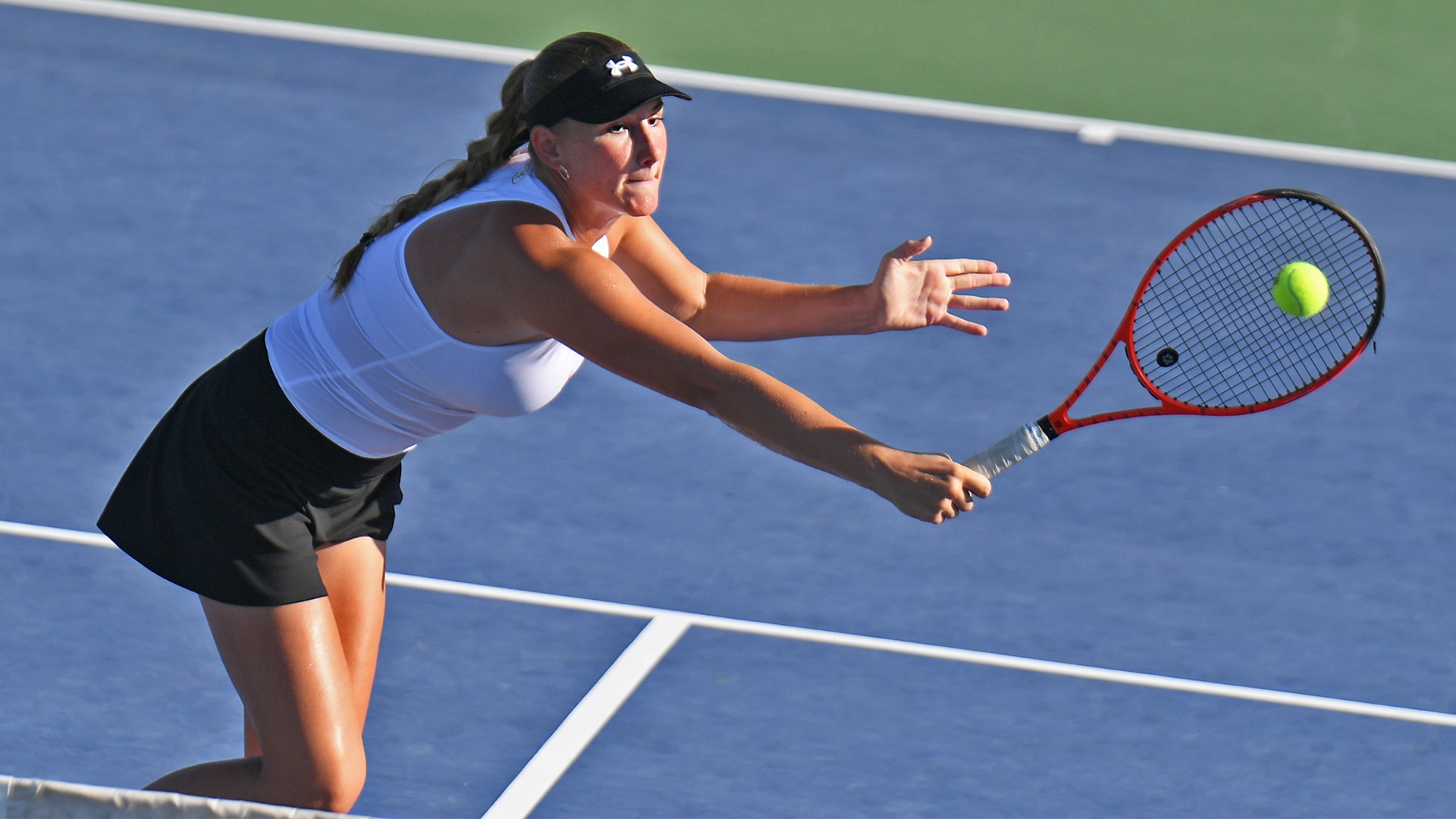 Zala Vnuk plays a backhand at the net during Day 2 of the Lady Demon Invitational