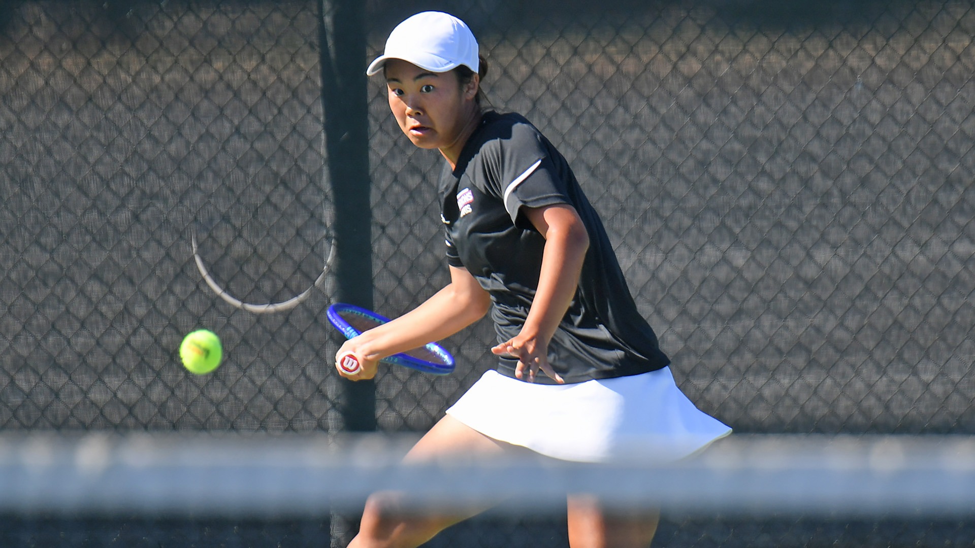 Nico Tagami returns a shot during Day 1 of the Lady Demon Invitational