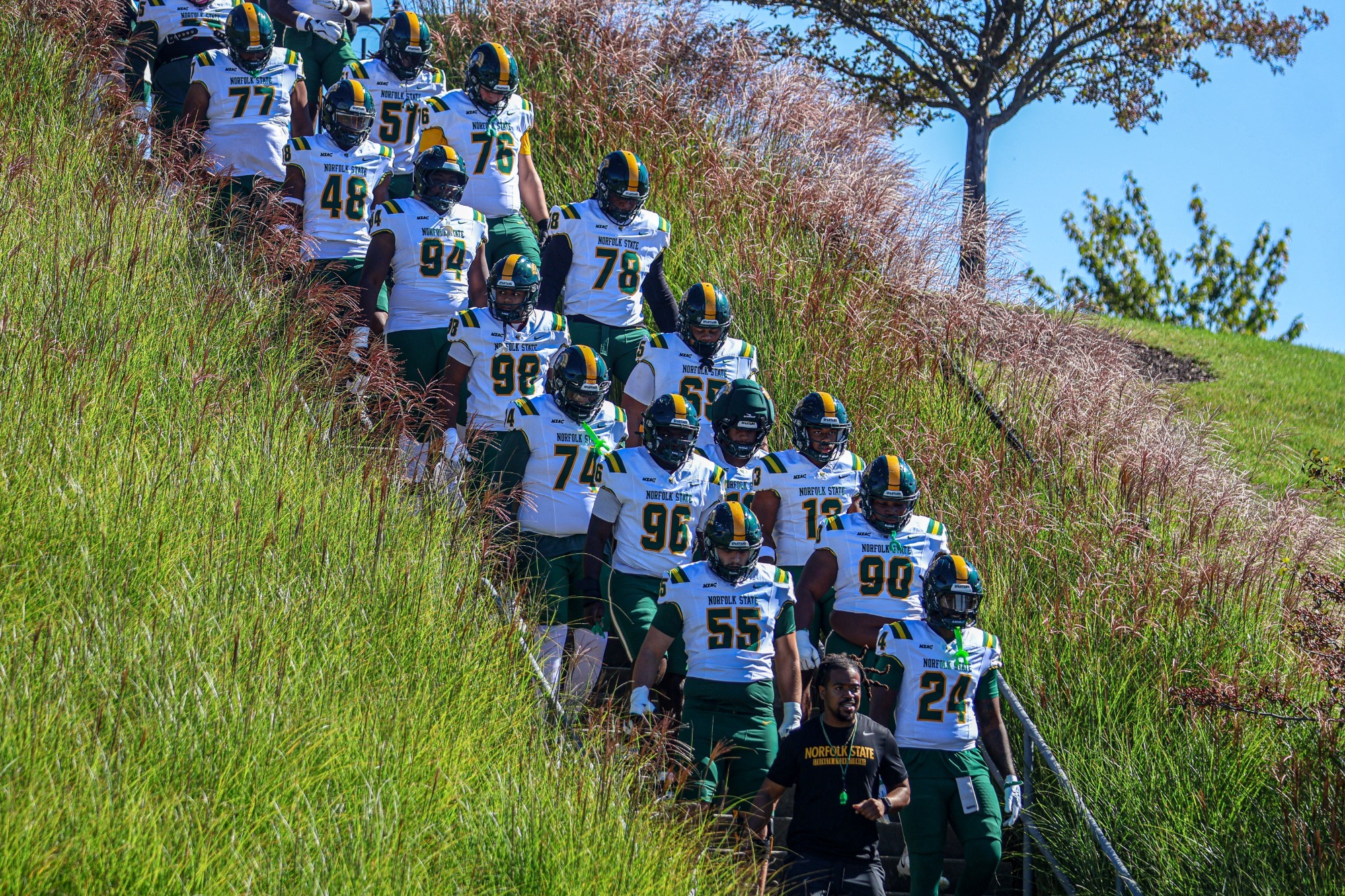 Team descending stairs at Robert Morris