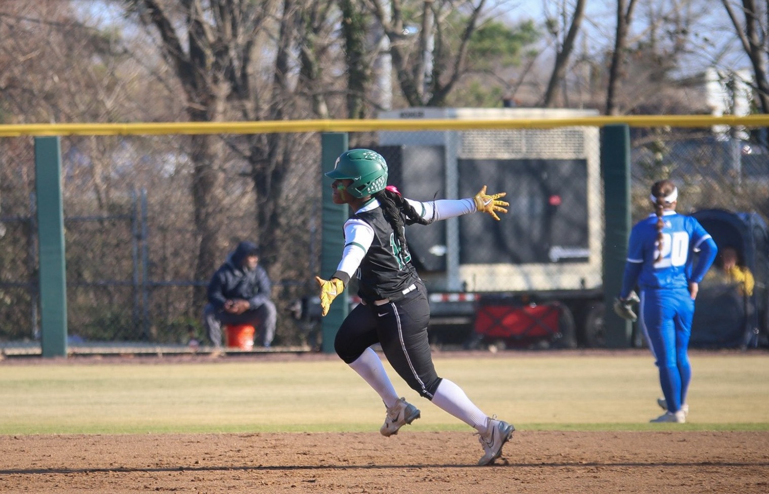 Qween Edmonds celebrates a homerun