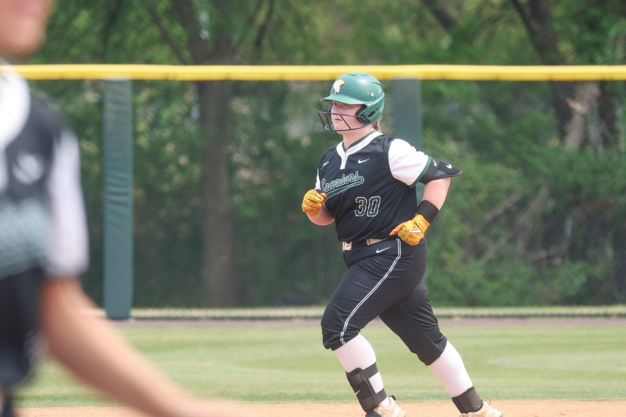 Maddy Morris trots the base paths after homerun hit