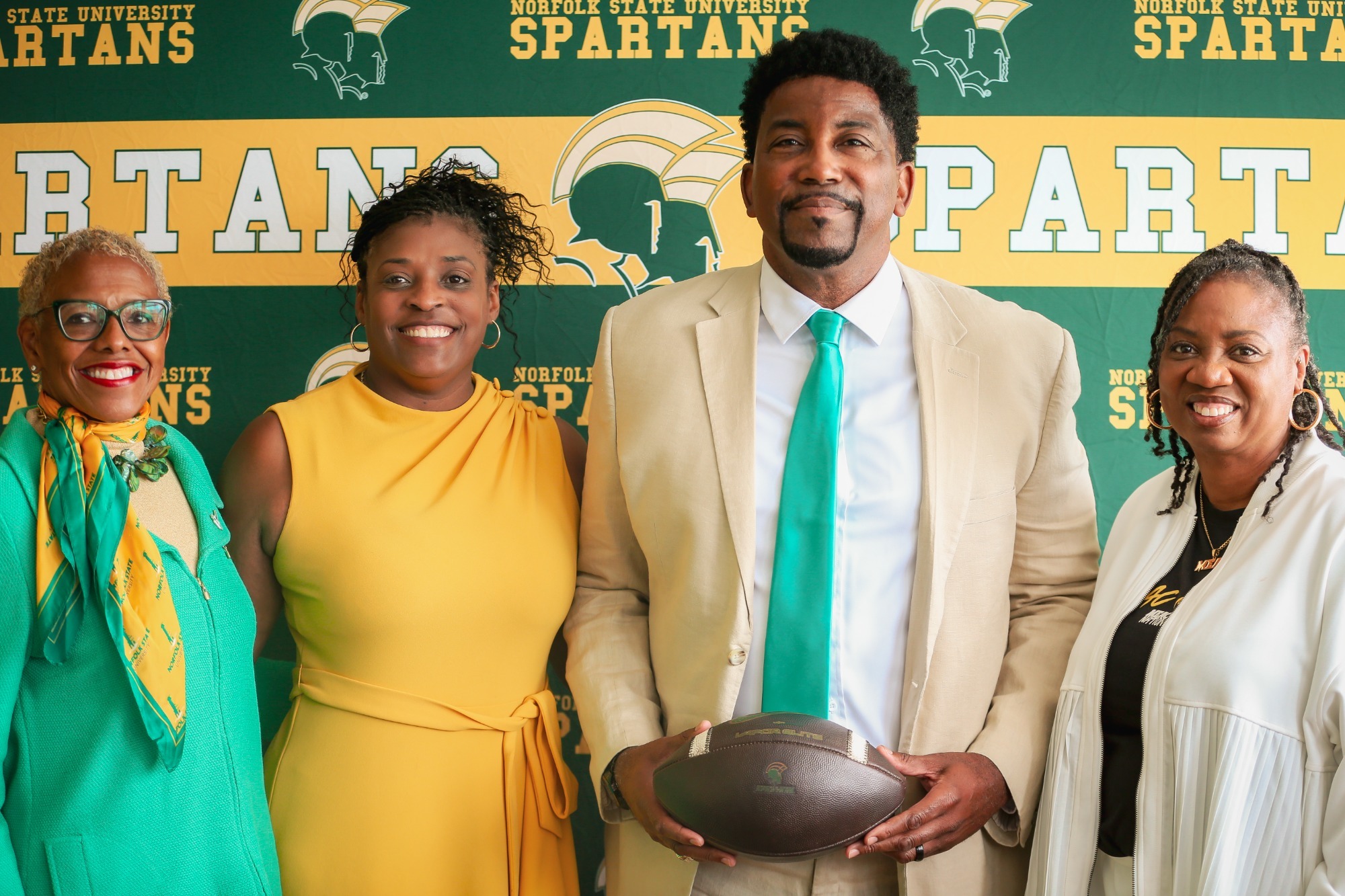 Pictured with Dr. J, Dr. Webb and Commissioner Stills. 