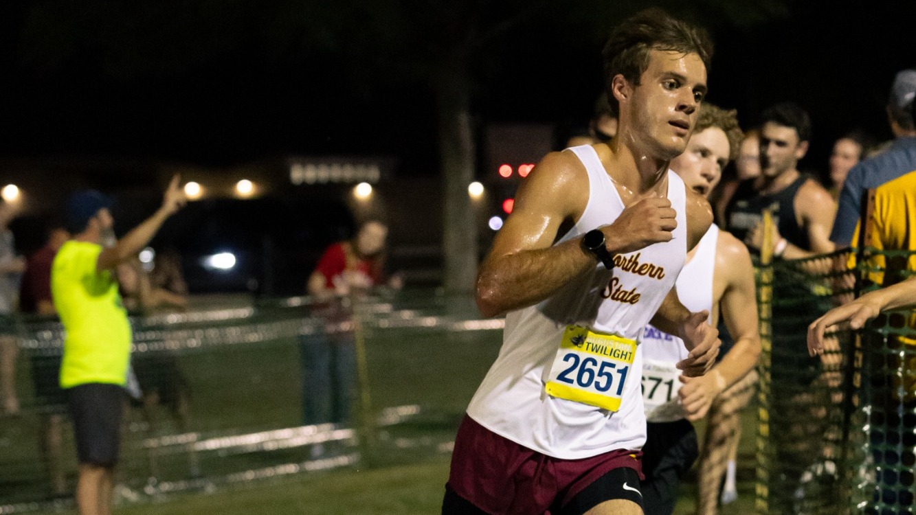 Zach Terrio running the Augustana Twilight