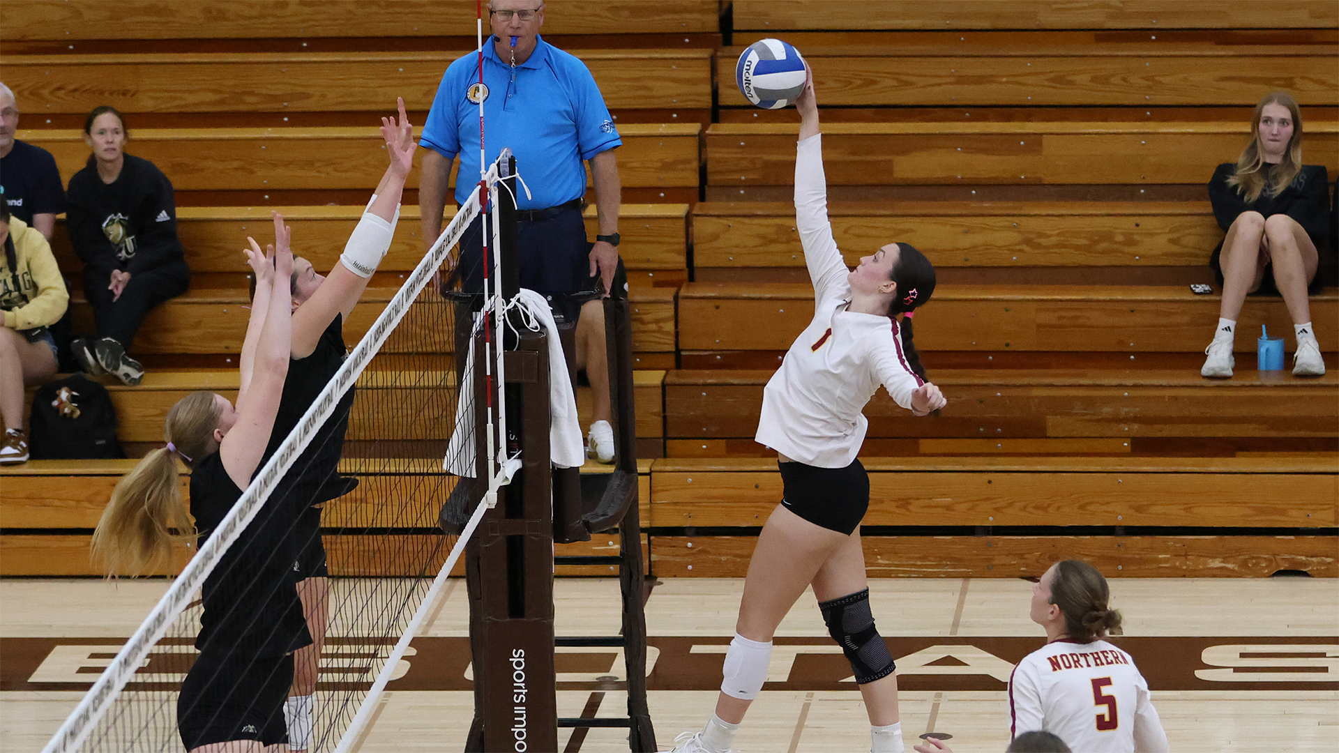 10.10 Volleyball Recap - Victoria Persha slams the ball on an attack against the SMSU Mustangs