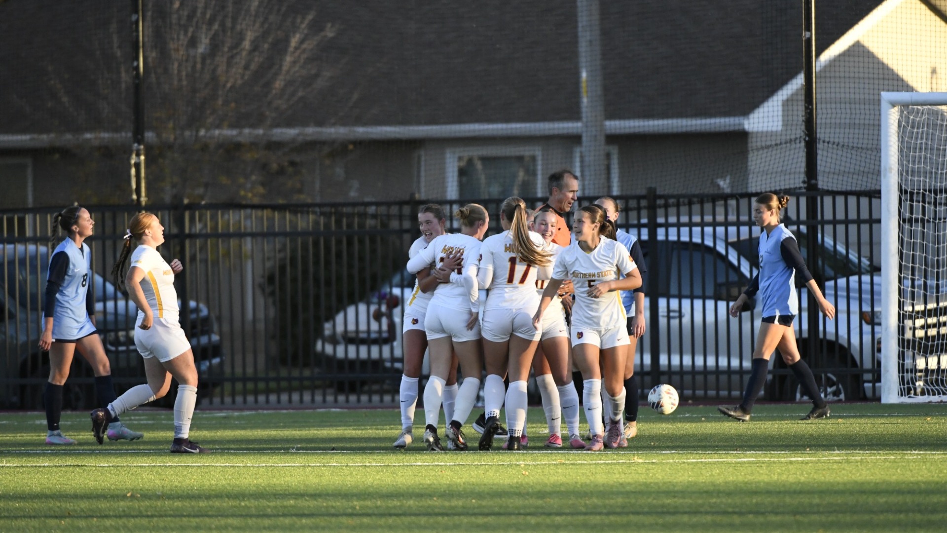 NSU team celebrating after Sarah Helderop scored the second goal of the night in NSU's 2-1 win over Augustana.