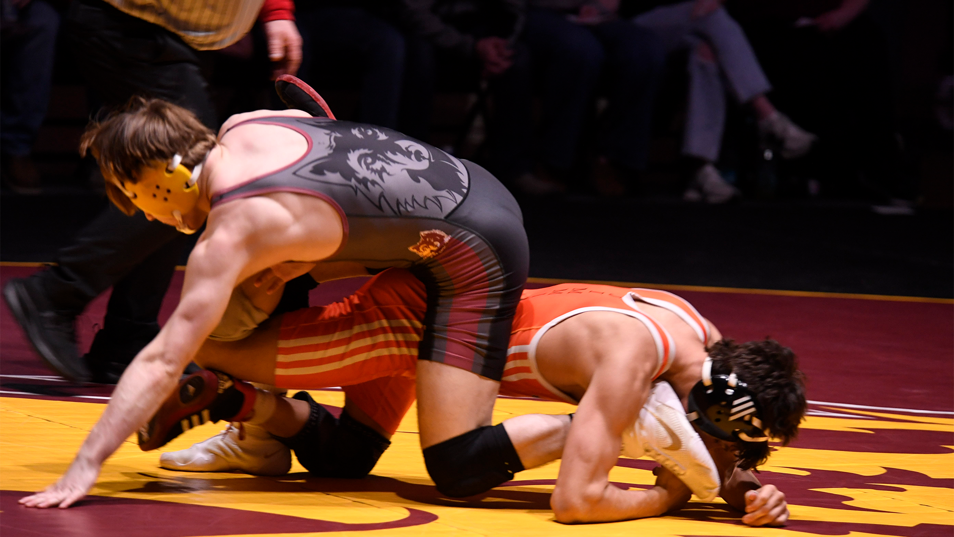 2026-27 Wrestling Preseason Standings - Sloan Johannsen mid-action against a Jamestown wrestler