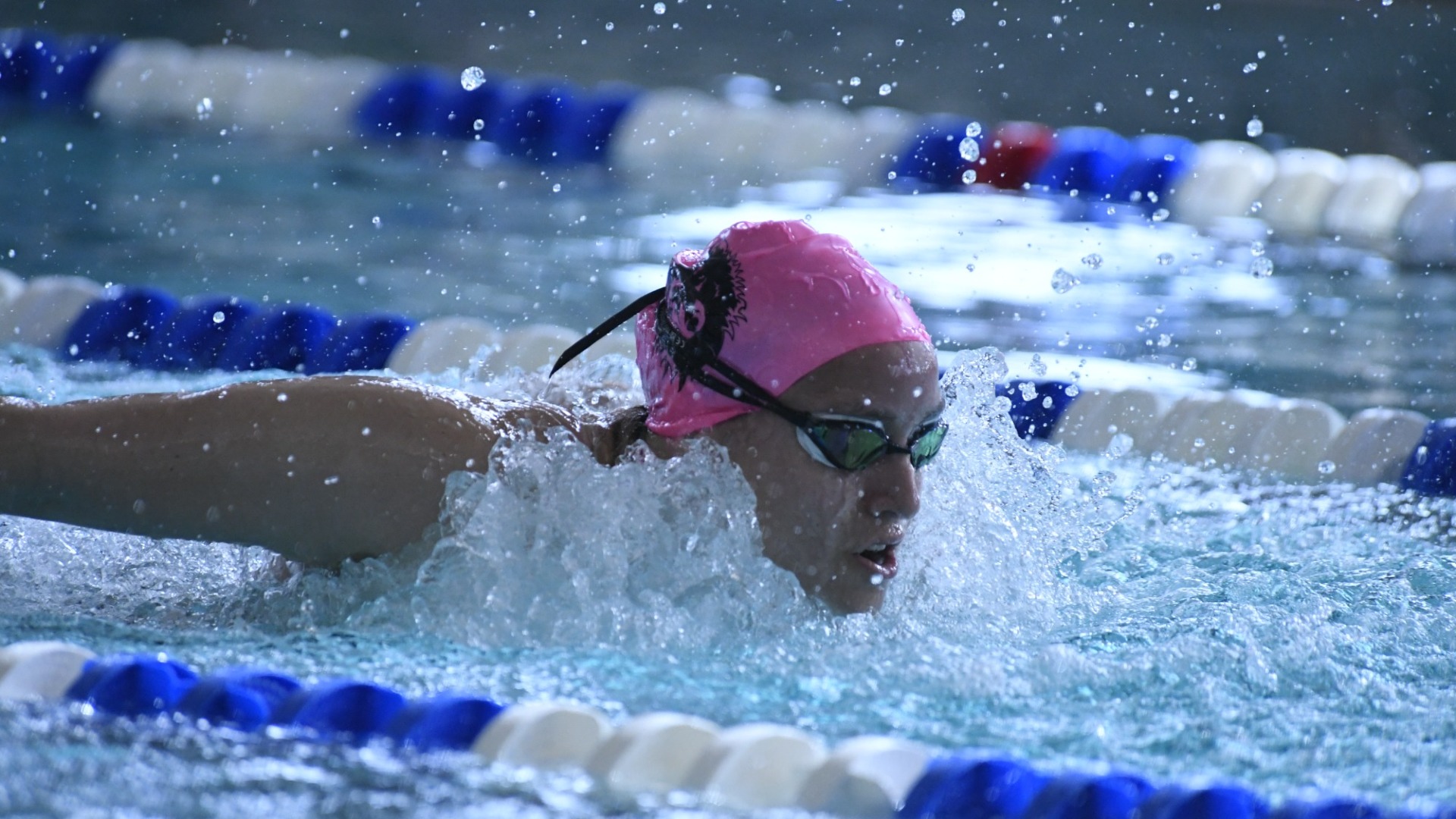 NSU swimmer taking breathes during a race in the water. Northern State would go on to lose 150-53 against MSUM.