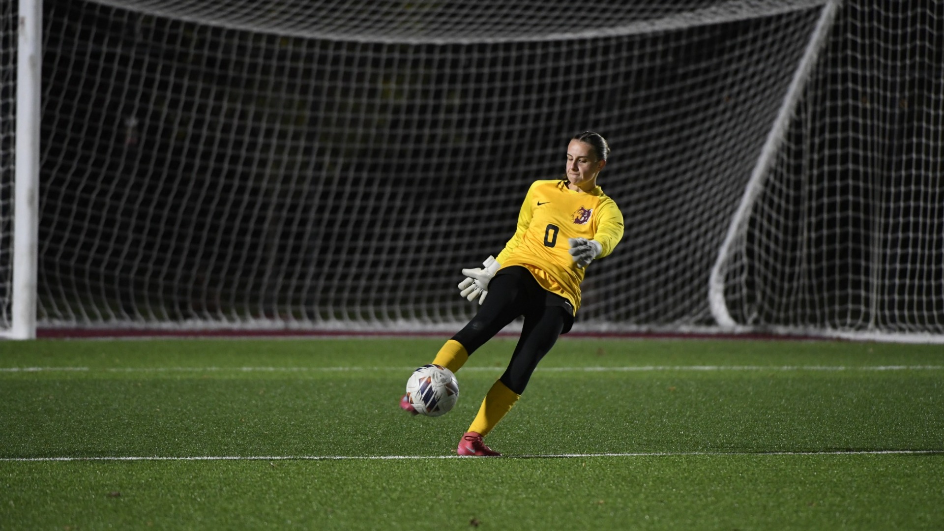 Northern State's Audrey Burns kicking the soccer ball after recording a save in NSU's 2-0 win over Jamestown.