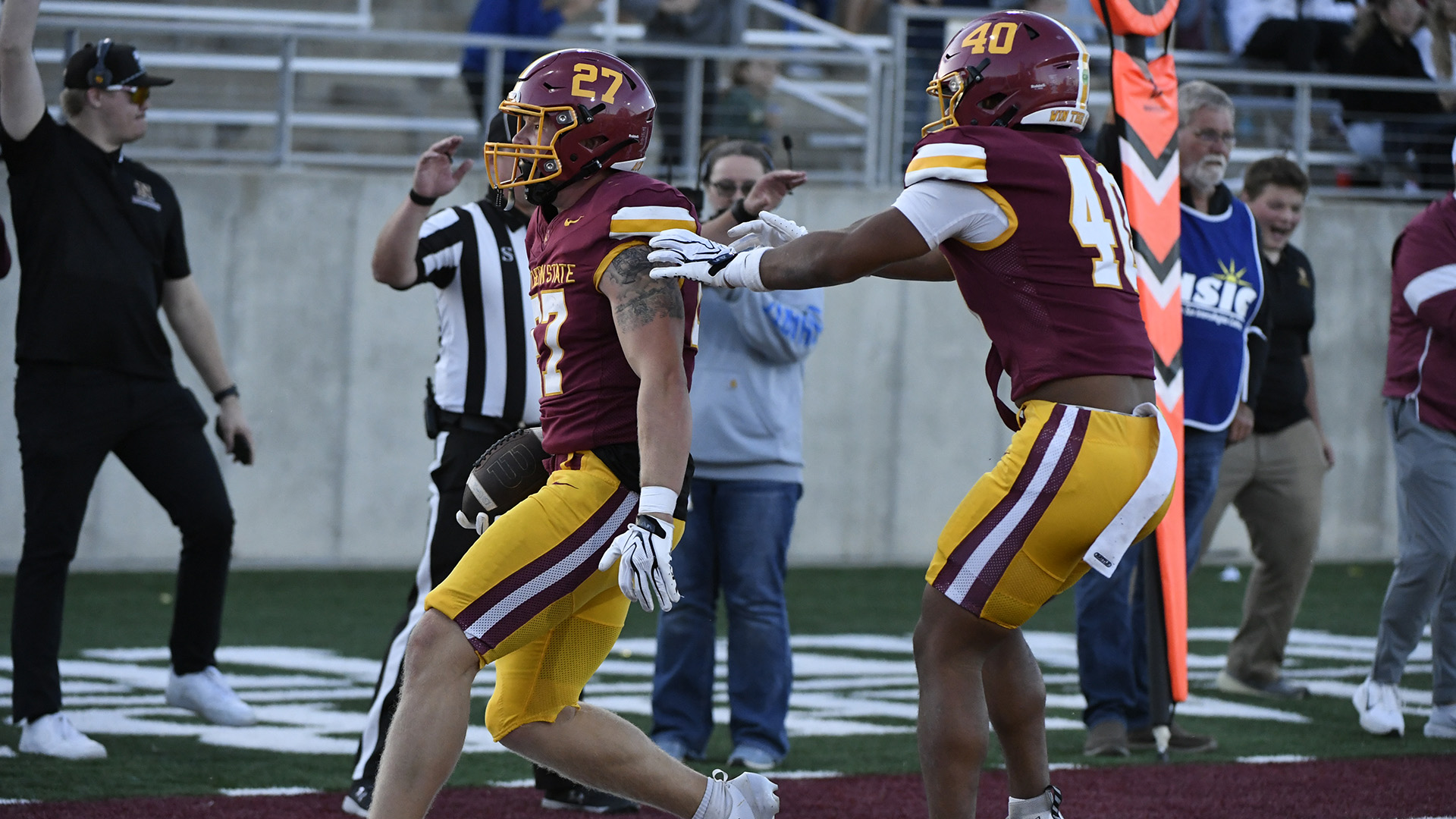 Kale Johnson scores a touchdowns on a blocked punt by Jackson Waitkus