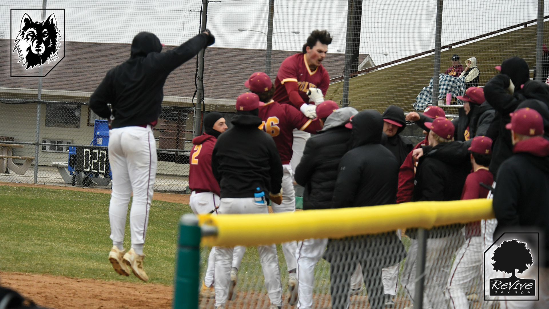 Drew Benson celebrates with dugout after home run