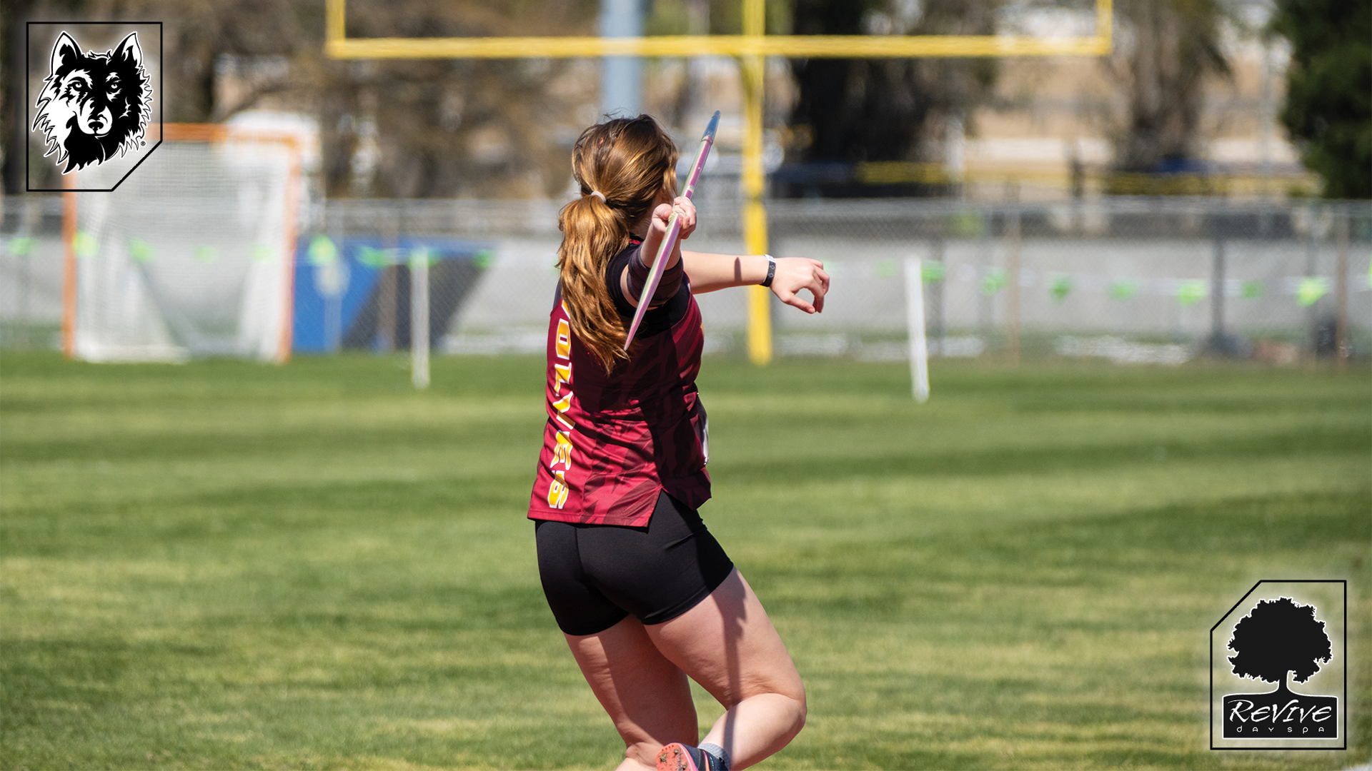Female Track athlete throws javelin At Alan Connie Shamrock Invite