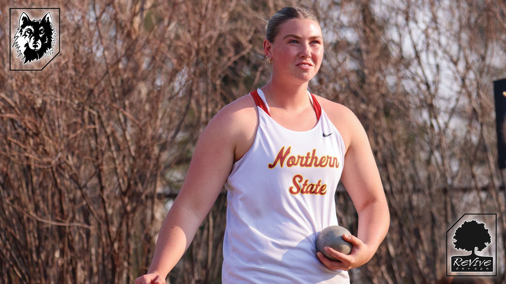 Grace Kuch gets set for her shot-put attempt