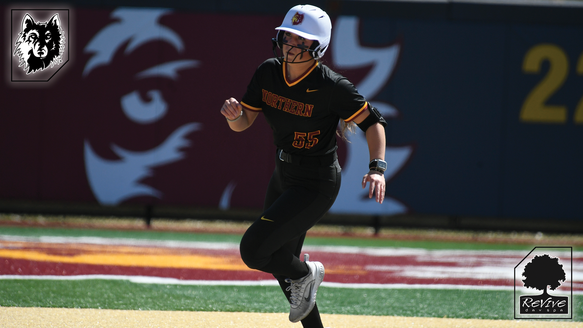 Northern freshman Alicia Jeanson rounding second in NSU win over Bemidji State at home.