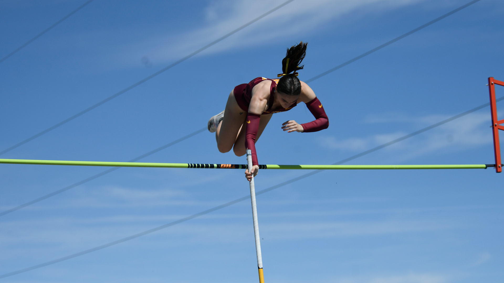 Romane Maugest hits her climax in the women's pole vault in the NSIC Championships