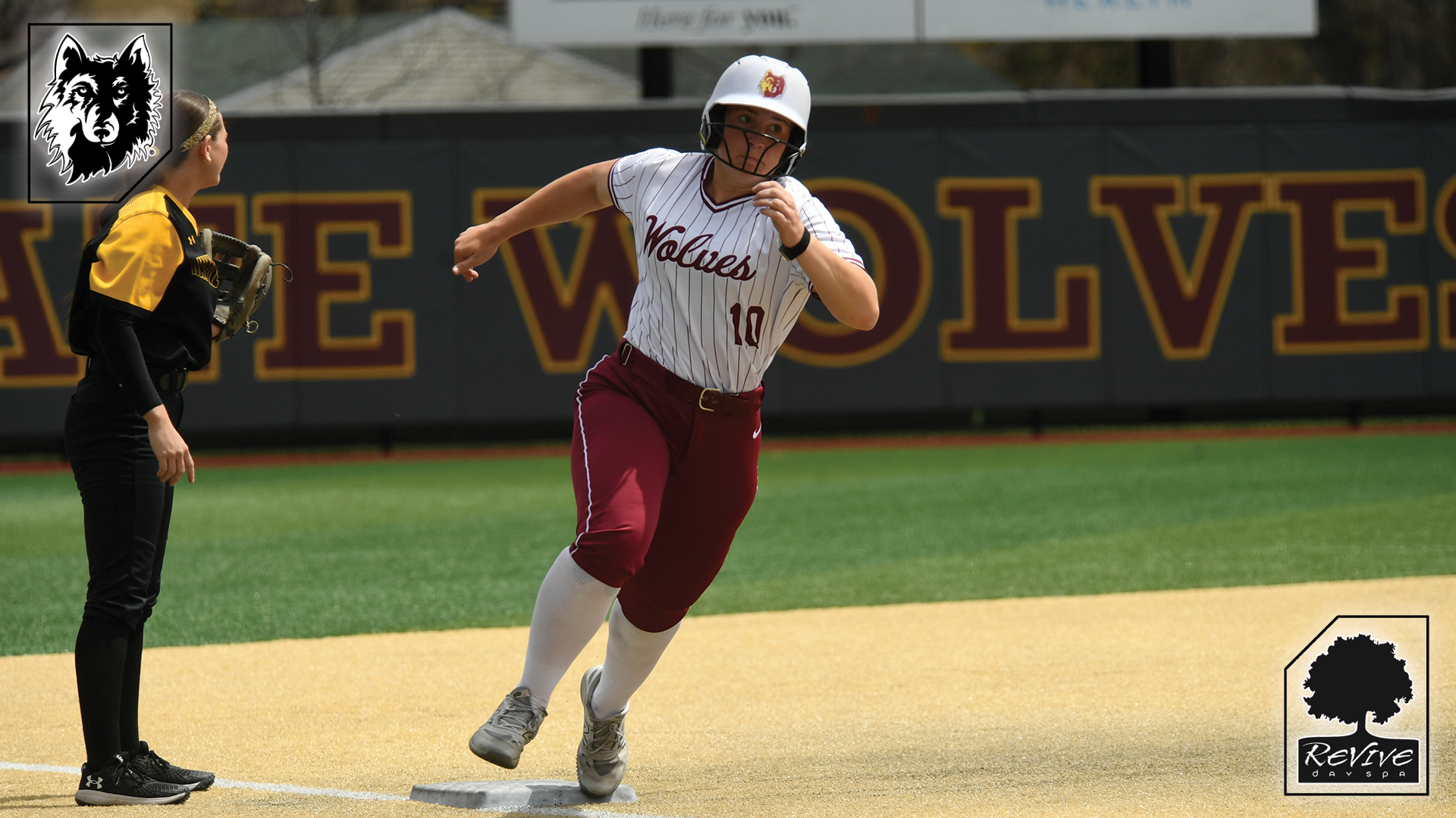 Madi Jones rounding third in Northern State's 3-2 victory over Wayne State College.