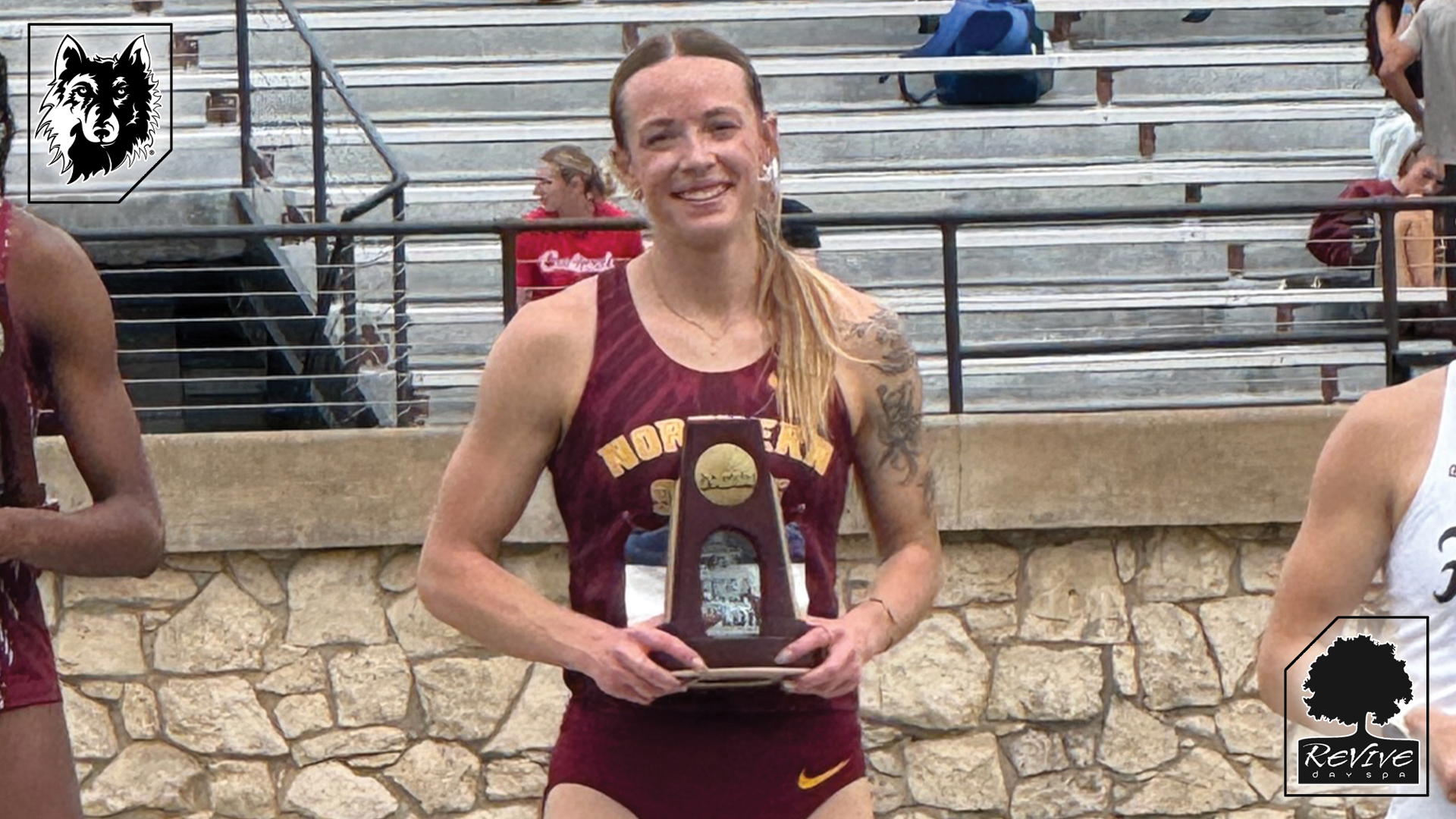 Renea Taylor stands atop the fourth place podium with her NCAA trophy after her personal best 400m hurdles performance at the NCAA Outdoor Championships
