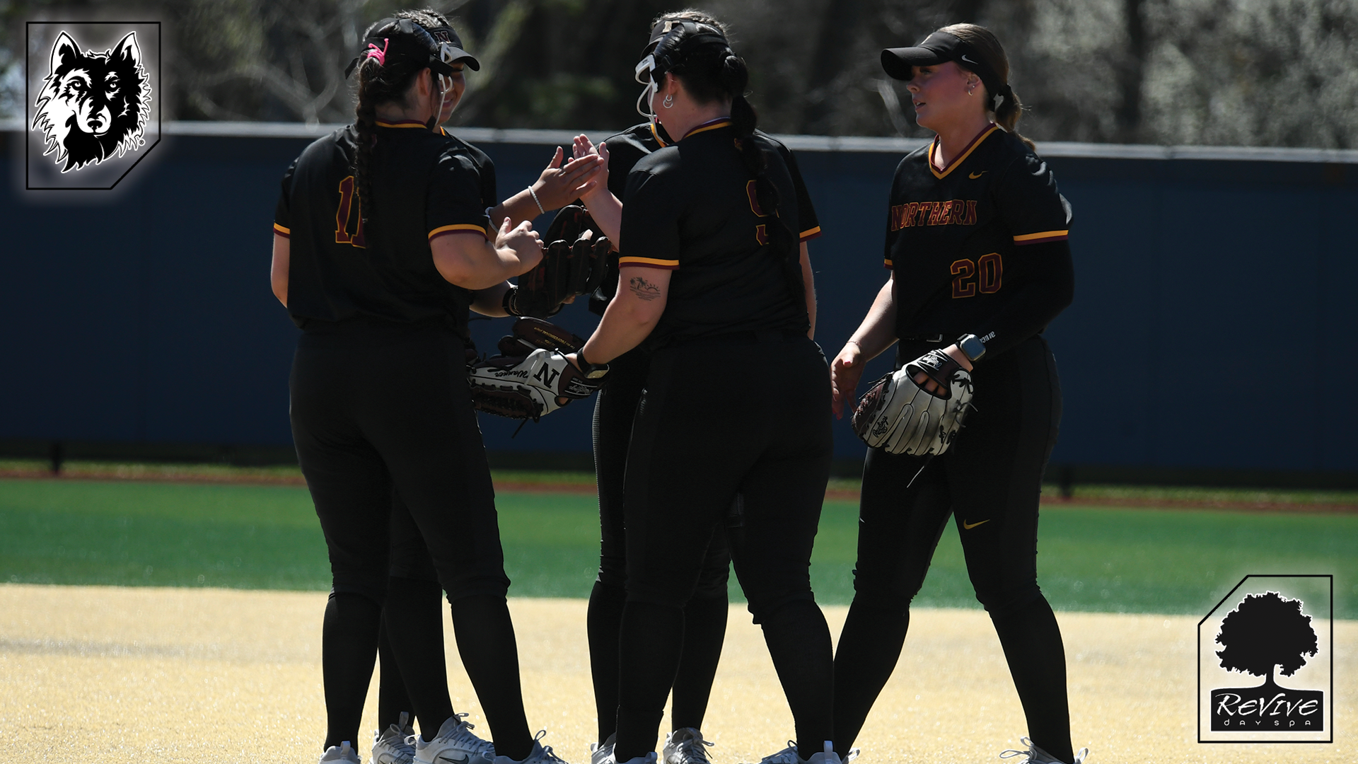 Northern State's infielders meet at the mound during their 3-2 win over Augustana.