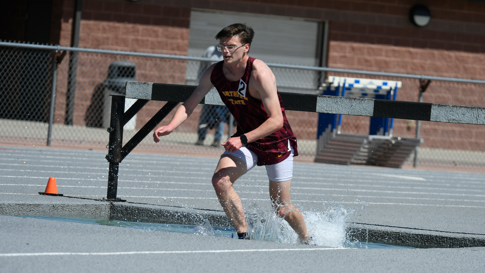 Blake Stoks going over the water barrier in the 3000m steeple