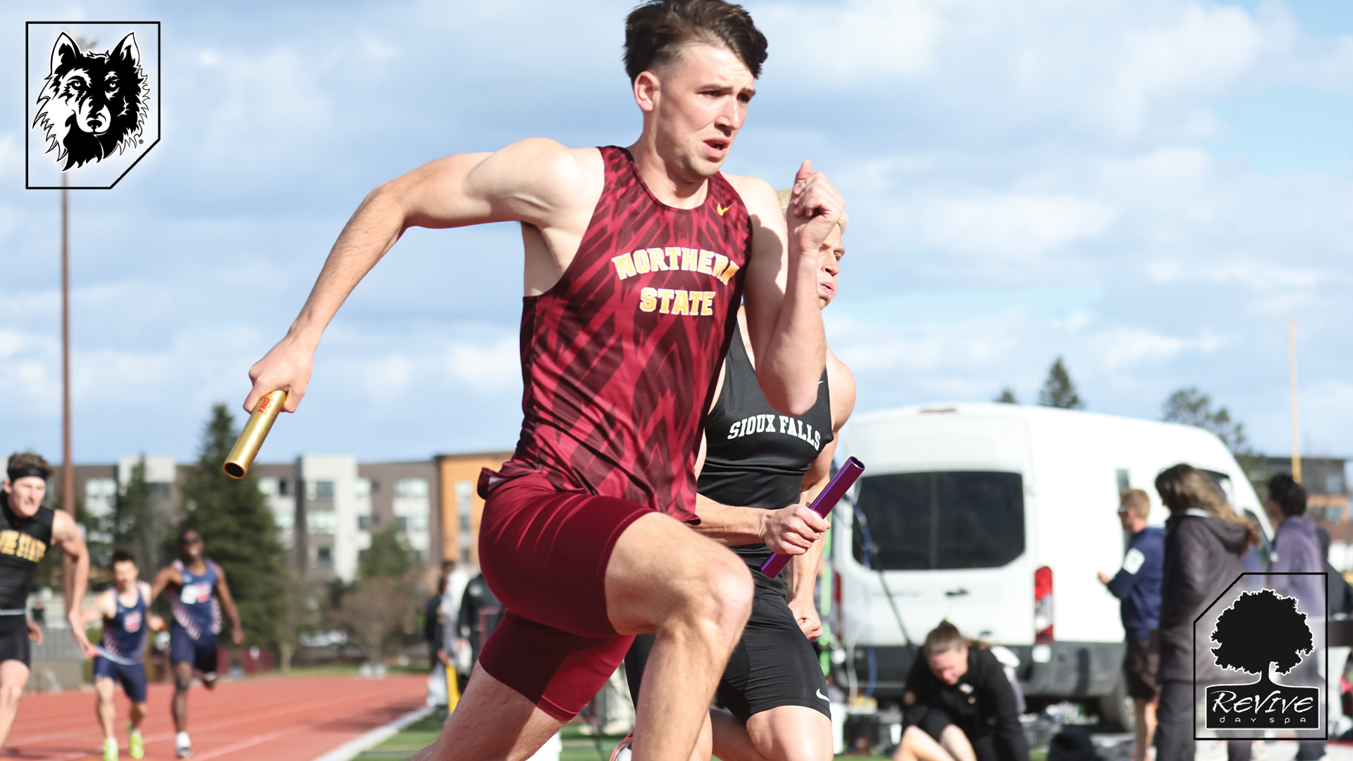 Carter Dingman takes the baton in the second leg of the first place finishing men's 4x400m relay in the NSIC Championship