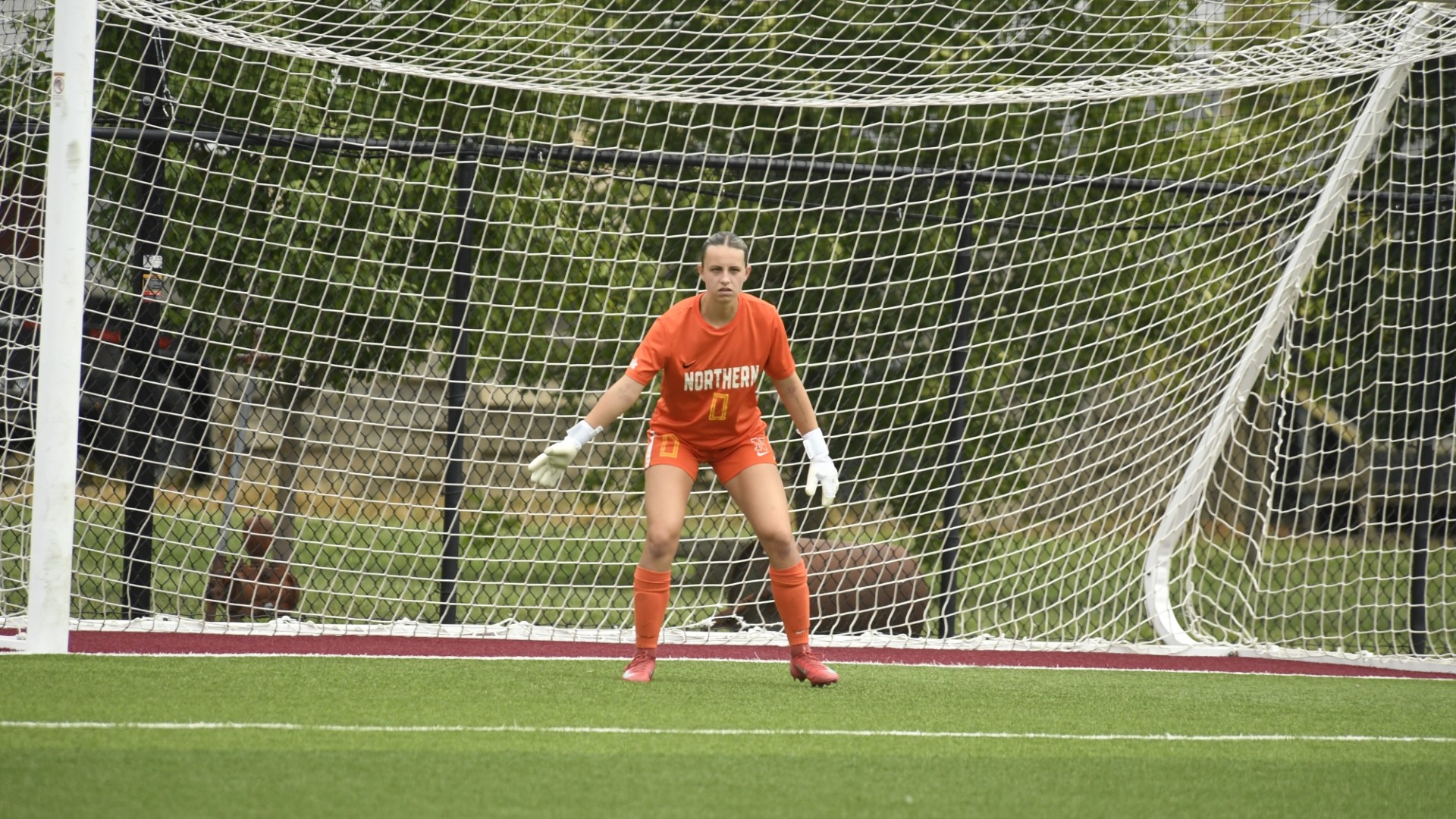 Audrey Burns standing in goal.