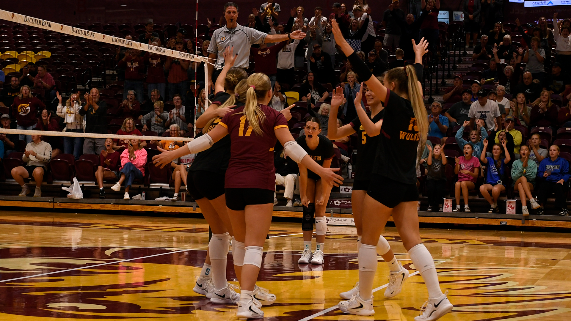 9.12 Volleyball Recap - Northern State volleyball players celebrate winning a point in a comeback victory over MSU Moorhead