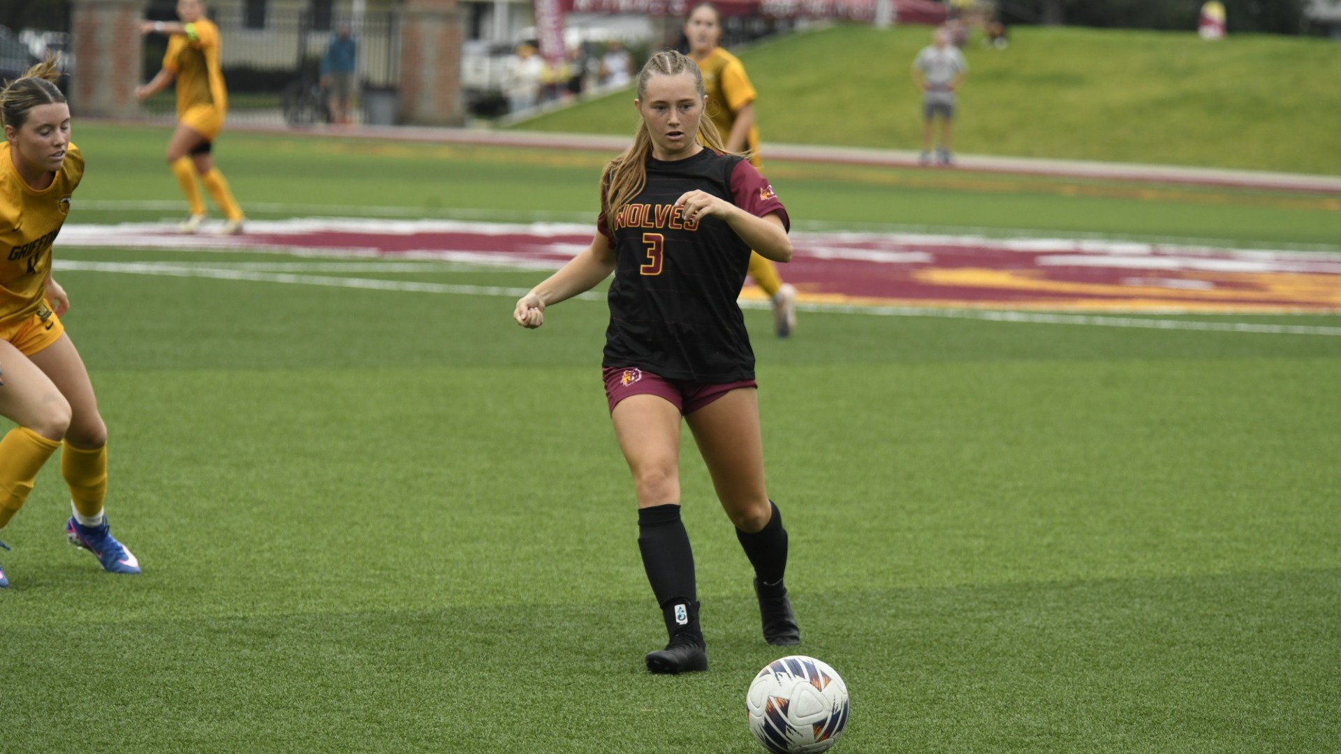 Chloe Voss making her way down the field against Missouri Western